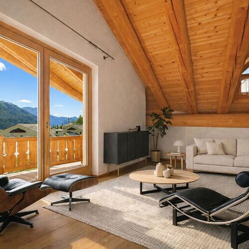 Sonnige Dachwohnung mit alpinem Flair und traumhafter Aussicht